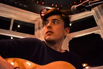 Sean Duggan musician artist songwriter and singer playing live at Sutton